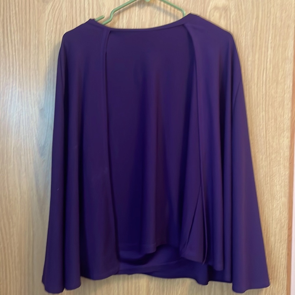 I’m an caped purple blouse, size medium